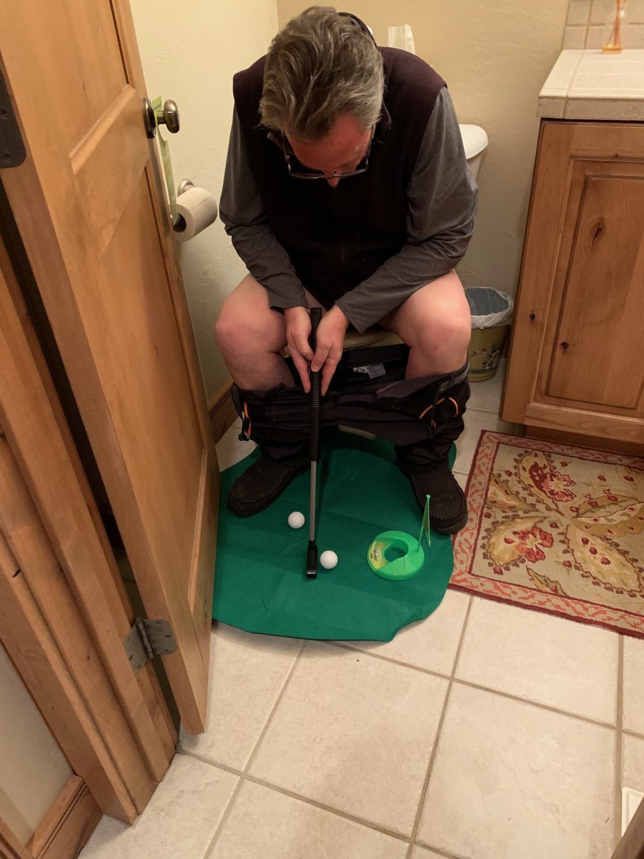 A playful toilet-putting photograph